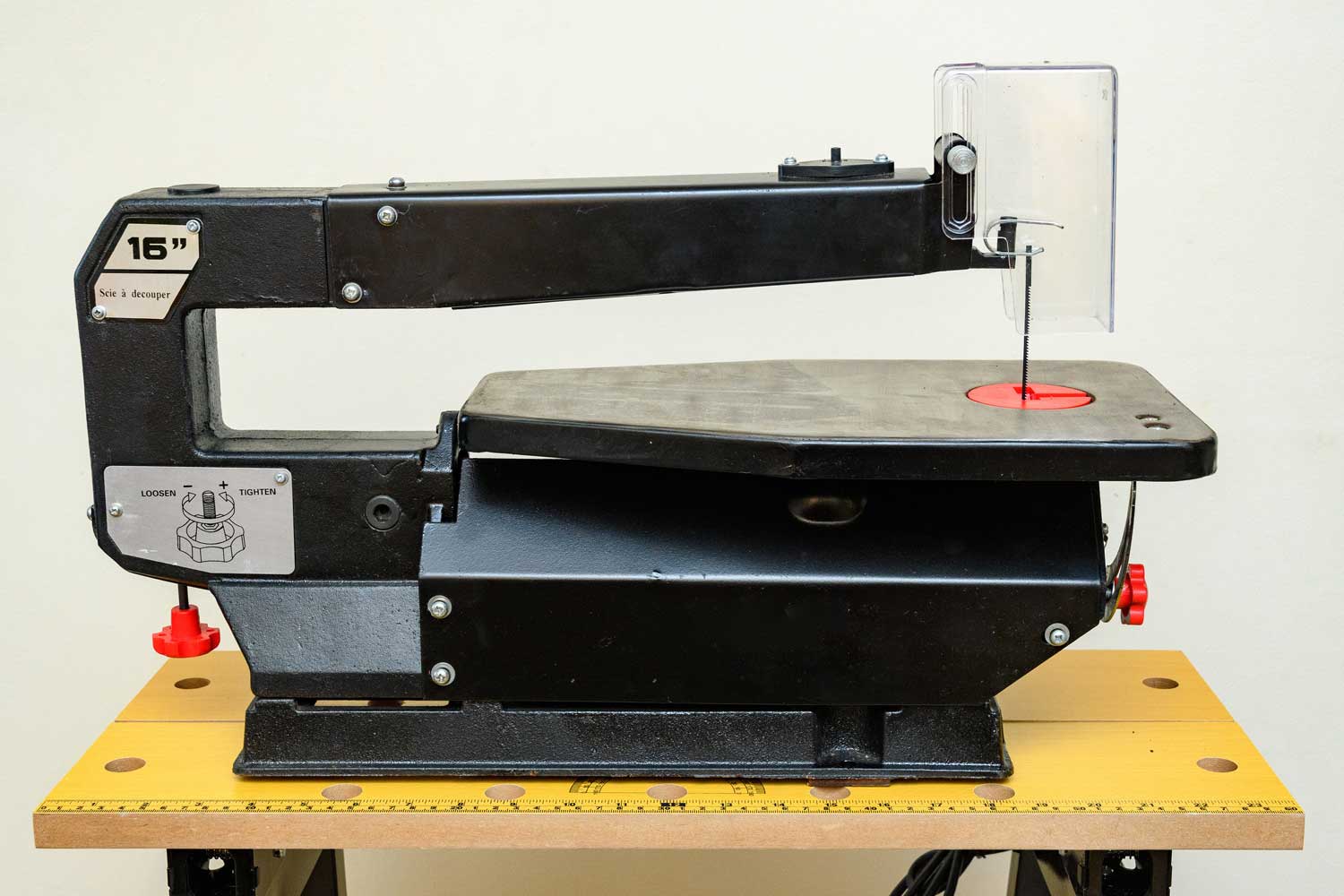 A scroll saw with a Pin End scroll saw blade